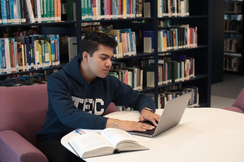 Student studying smarter with AI tools and a laptop