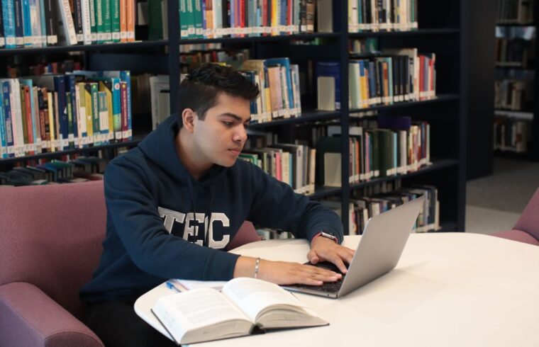 Student studying smarter with AI tools and a laptop
